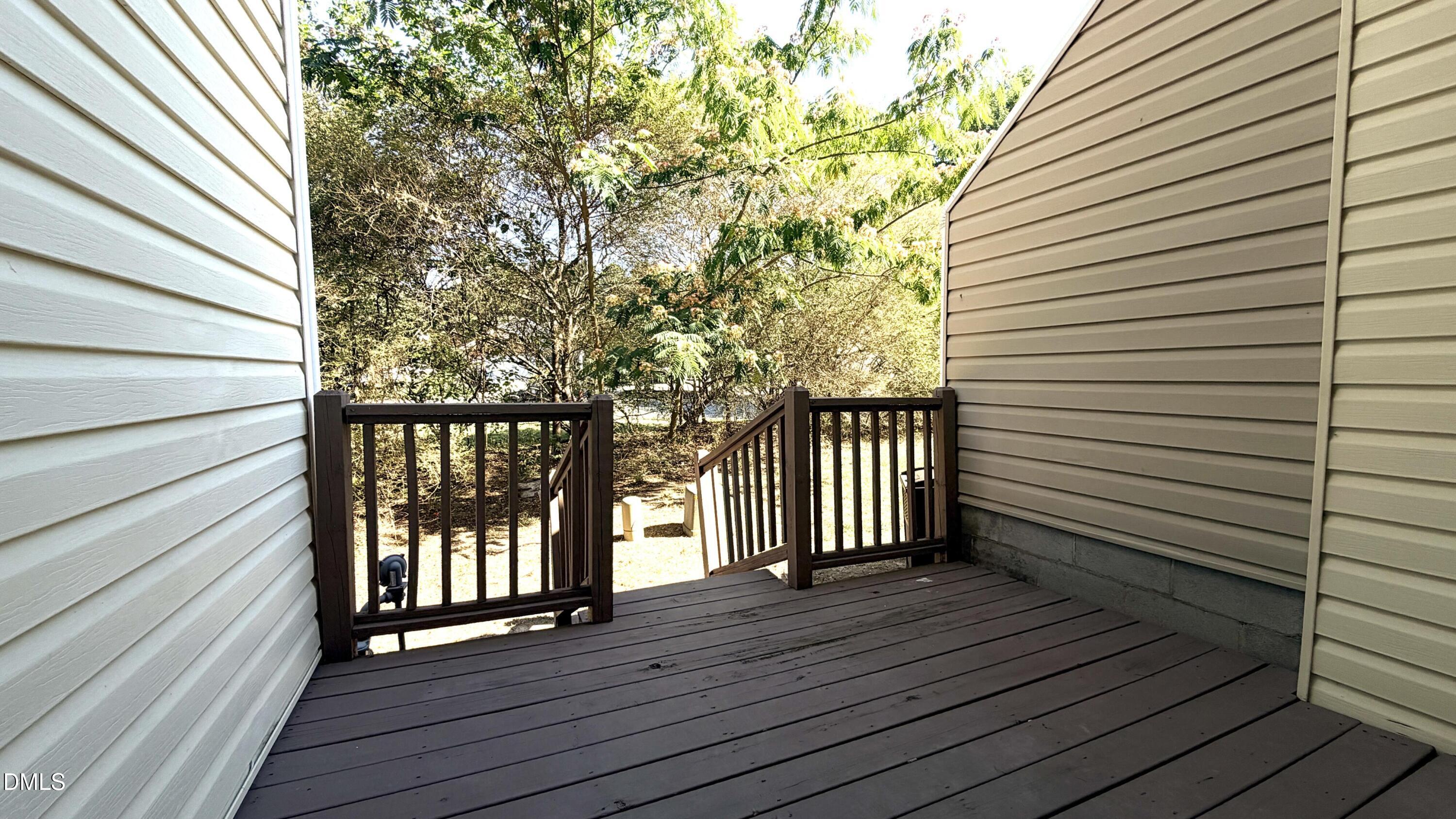 4123 Standing Rock Way Raleigh, NC 27604 - Photo 14 of 29 a view of wooden balcony with wooden floor