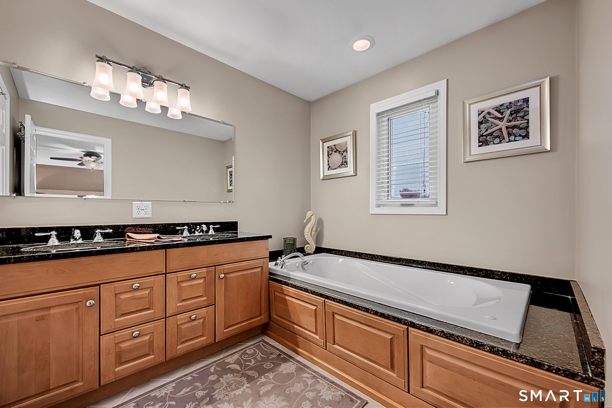 30 Silver Sands Road, Unit C9 East Haven, CT 06512 - Photo 12 of 36 a kitchen with granite countertop a sink stove and cabinets