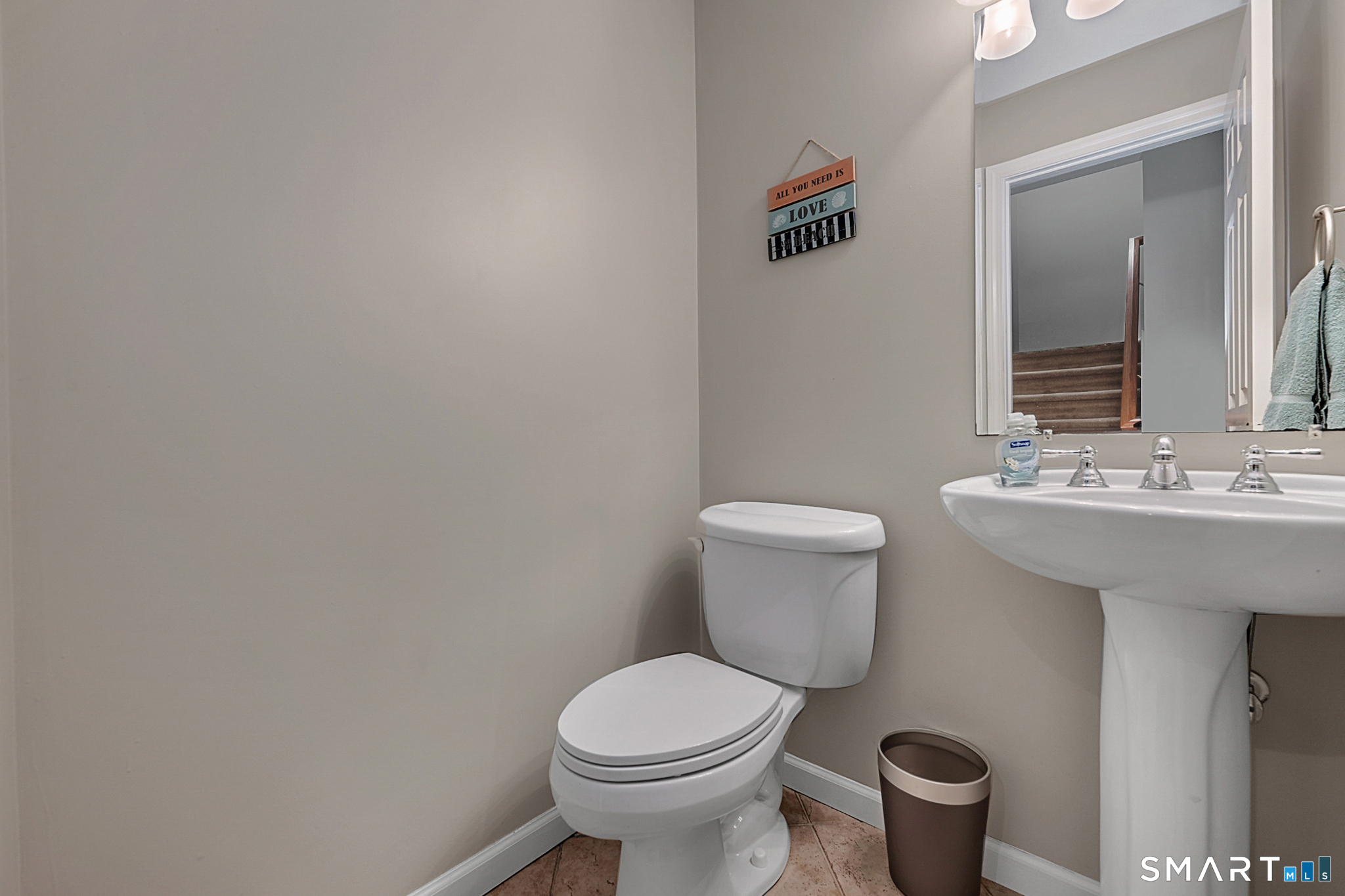 30 Silver Sands Road, Unit C9 East Haven, CT 06512 - Photo 14 of 36 a bathroom with a sink and a toilet