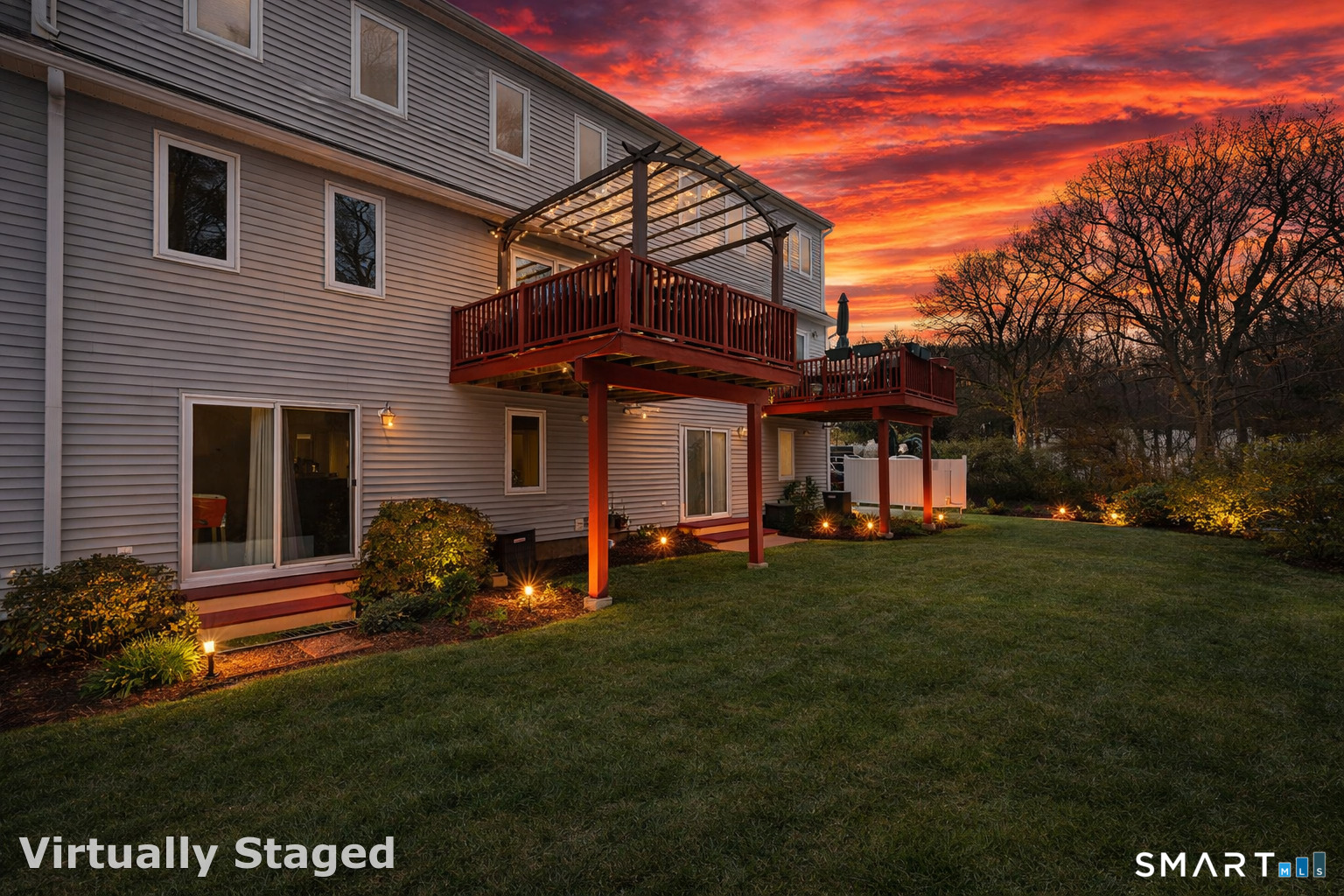 30 Silver Sands Road, Unit C9 East Haven, CT 06512 - Photo 2 of 36 a front view of a house with a yard table and chairs