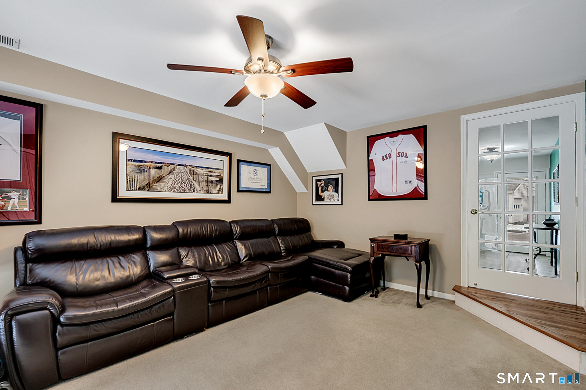30 Silver Sands Road, Unit C9 East Haven, CT 06512 - Photo 21 of 36 a living room with furniture ceiling fan and a window