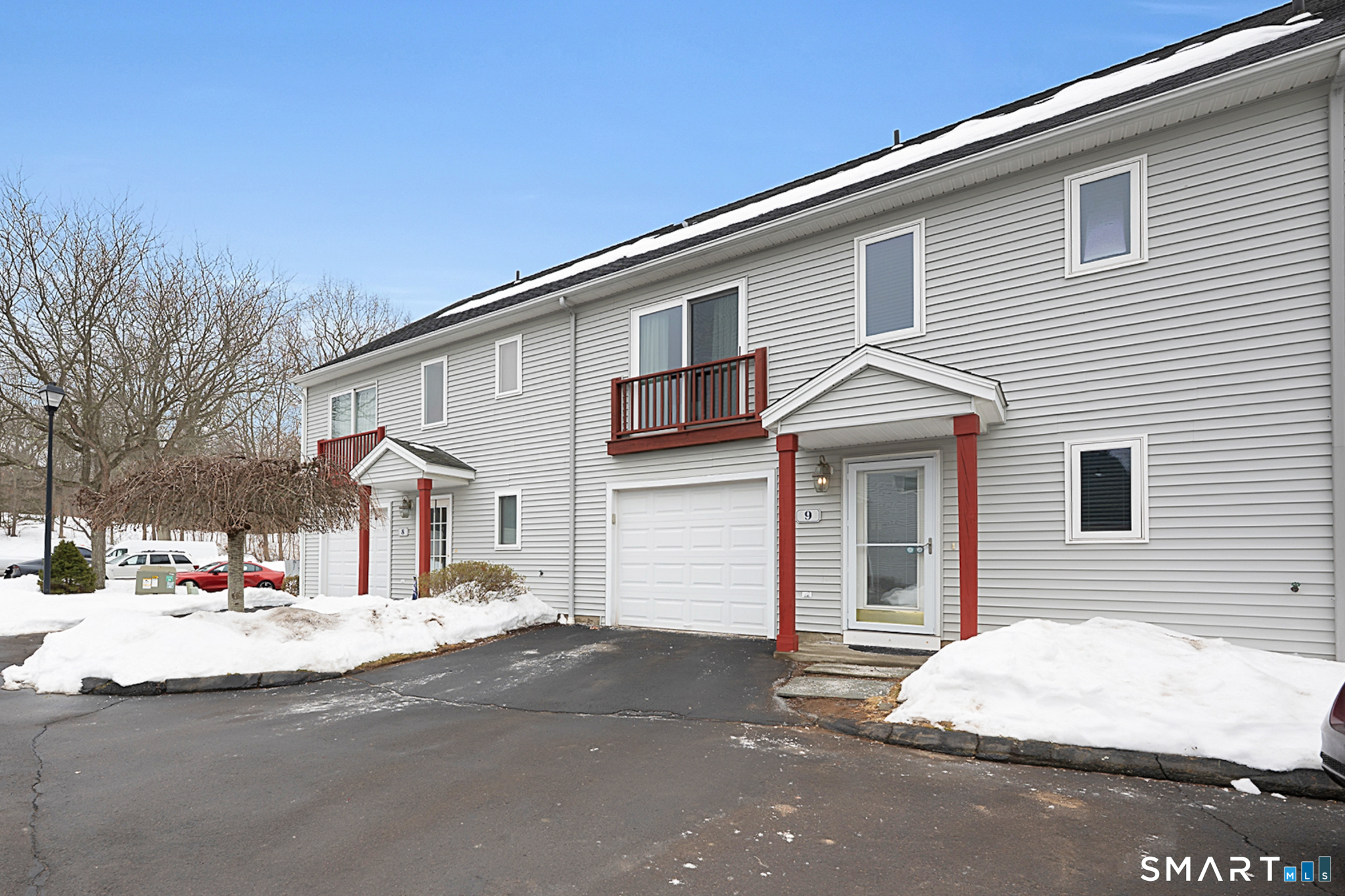 30 Silver Sands Road, Unit C9 East Haven, CT 06512 - Photo 29 of 36 a front view of a house with a road