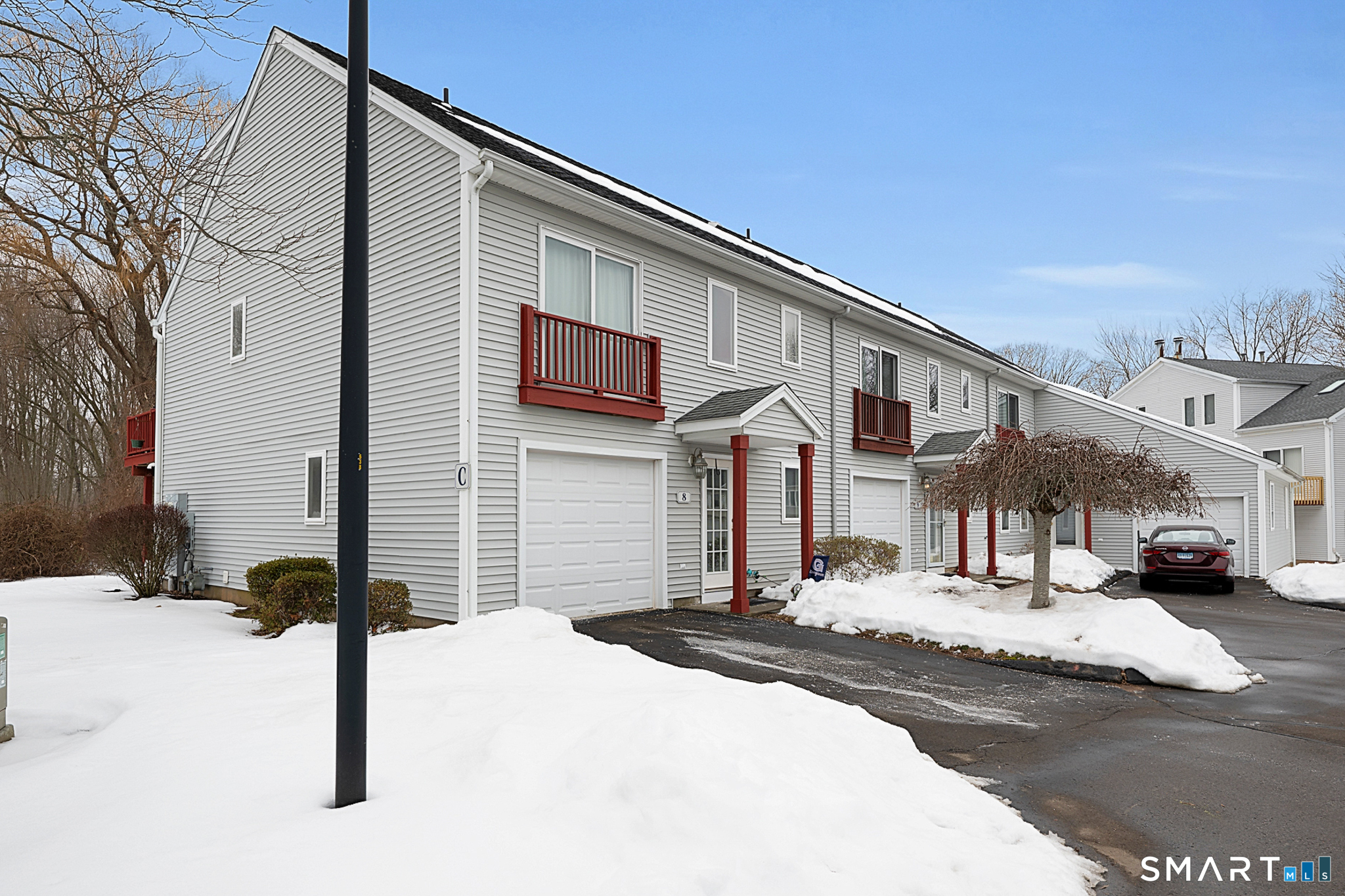 30 Silver Sands Road, Unit C9 East Haven, CT 06512 - Photo 31 of 36 a front view of a building with street