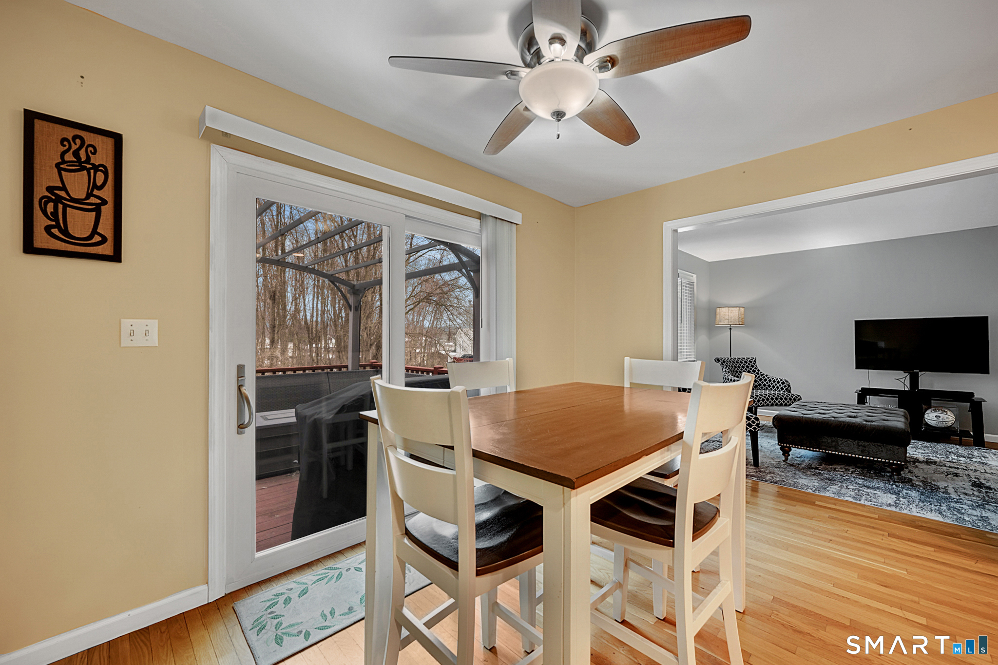 30 Silver Sands Road, Unit C9 East Haven, CT 06512 - Photo 7 of 36 a view of a dining room with furniture window and wooden floor