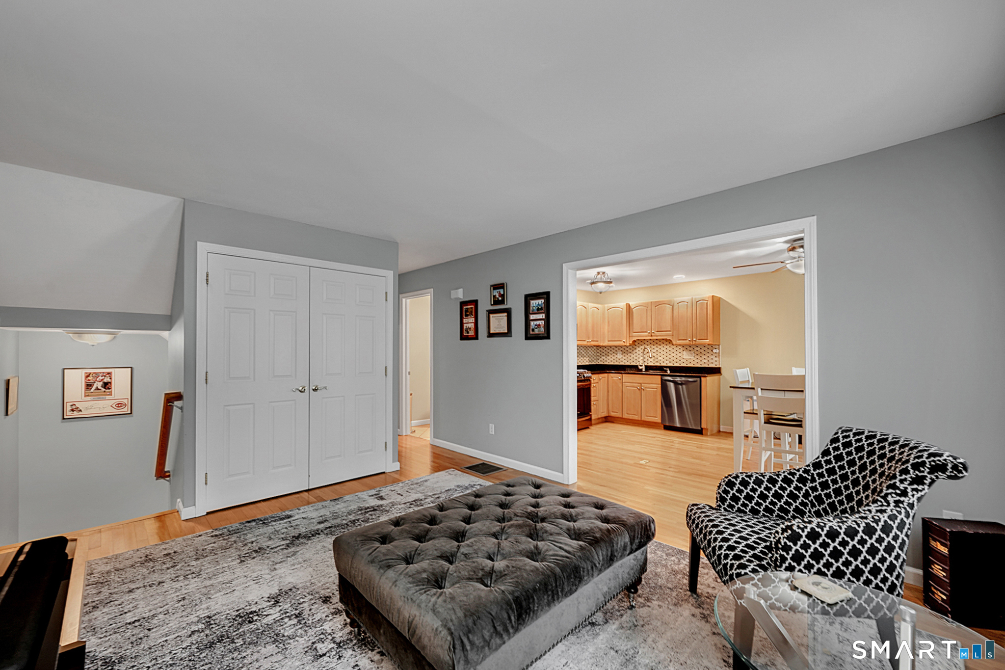 30 Silver Sands Road, Unit C9 East Haven, CT 06512 - Photo 9 of 36 a bedroom with furniture and a rug