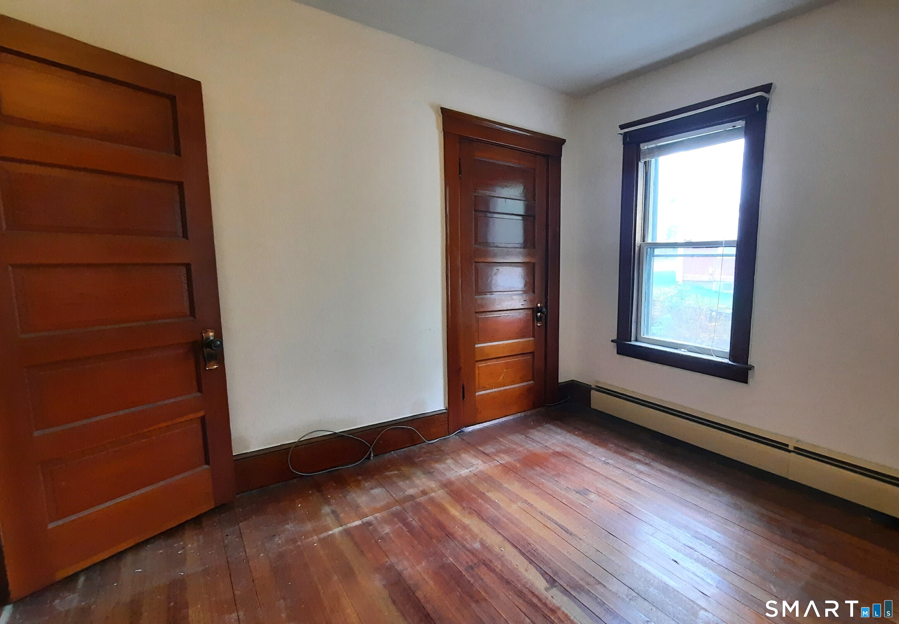15 Milton Street Putnam, CT 06260 - Photo 12 of 20 first floor bedroom