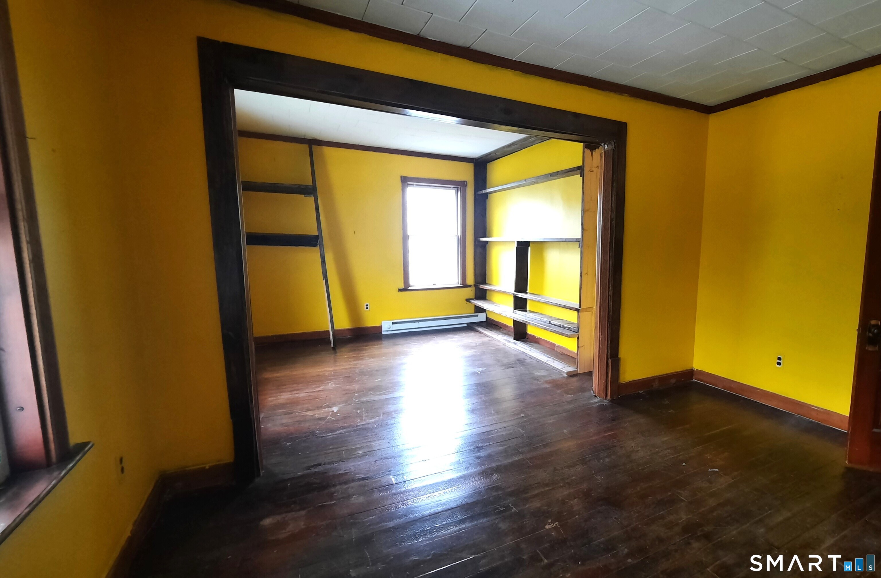 15 Milton Street Putnam, CT 06260 - Photo 15 of 20 2nd floor living room