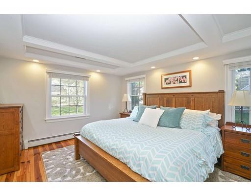 20 Manning Street Lexington, MA 02421 - Photo 12 of 21 a bedroom with a bed and a large window