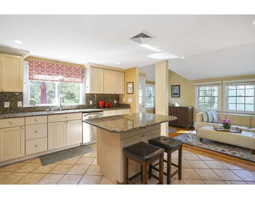 20 Manning Street Lexington, MA 02421 - Photo 8 of 21 a kitchen with stainless steel appliances granite countertop a sink and cabinets
