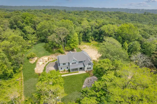 a view of a house with a garden