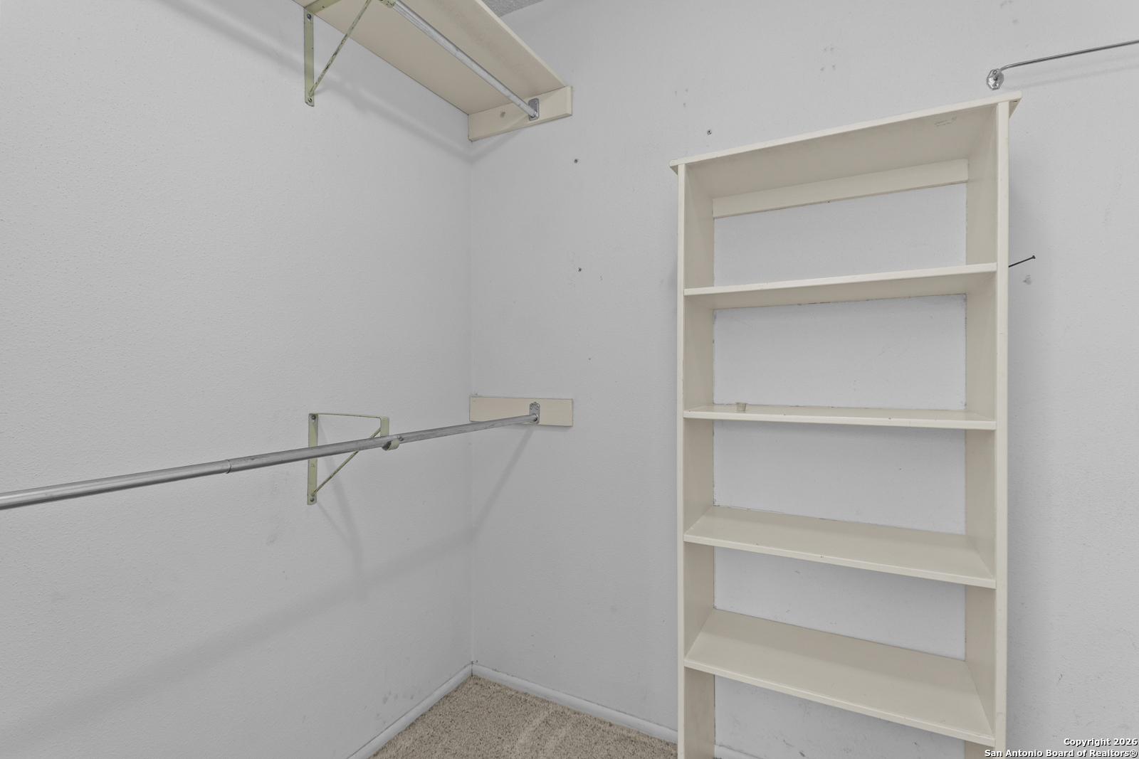 33171 Blanco Road Bulverde, TX 78163 - Photo 24 of 59 a view of an empty walk in closet