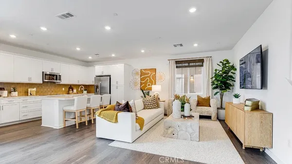 a living room with furniture and a table