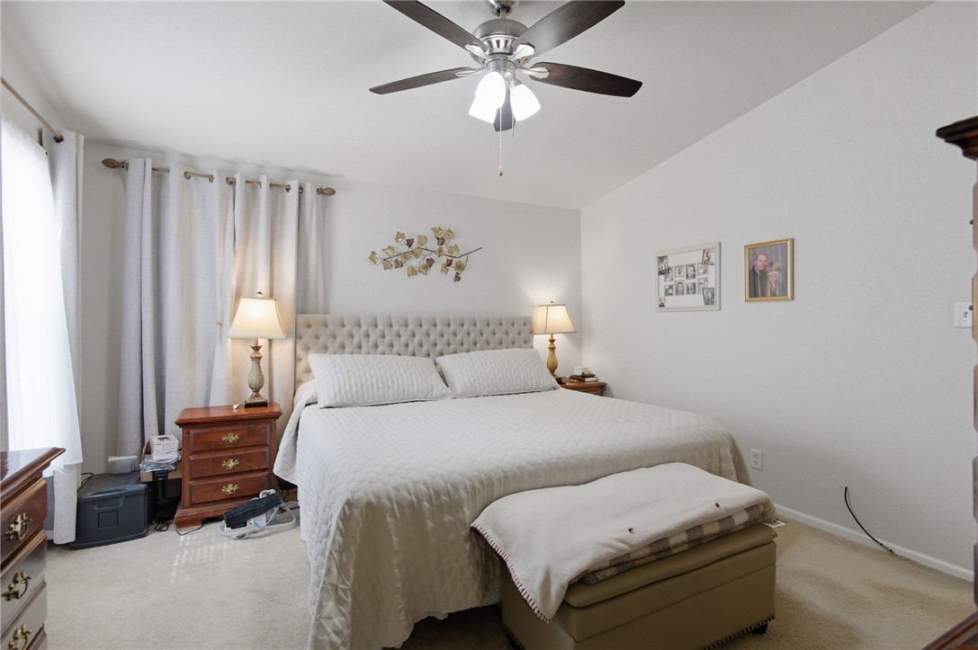 4342 Cordes Road Golden Valley, AZ 86413 - Photo 32 of 39 a bedroom with a bed and a chandelier