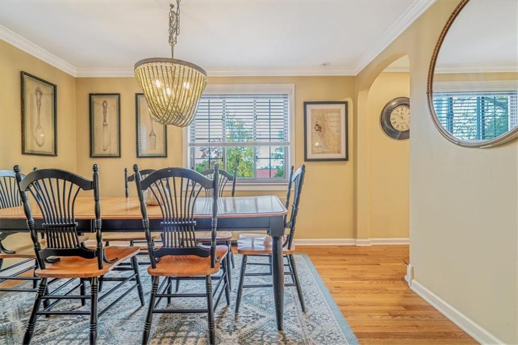 21 Marquette Road Pittsburgh, PA 15229 - Photo 17 of 44 a view of a dining room with furniture a chandelier and wooden floor