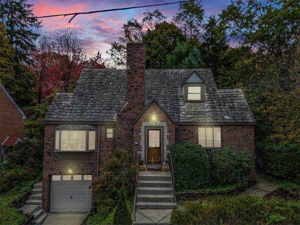 21 Marquette Road Pittsburgh, PA 15229 - Photo 2 of 44 a front view of a house with plants and trees