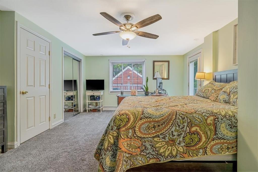 21 Marquette Road Pittsburgh, PA 15229 - Photo 24 of 44 a bed sitting in a spacious bedroom next to a window