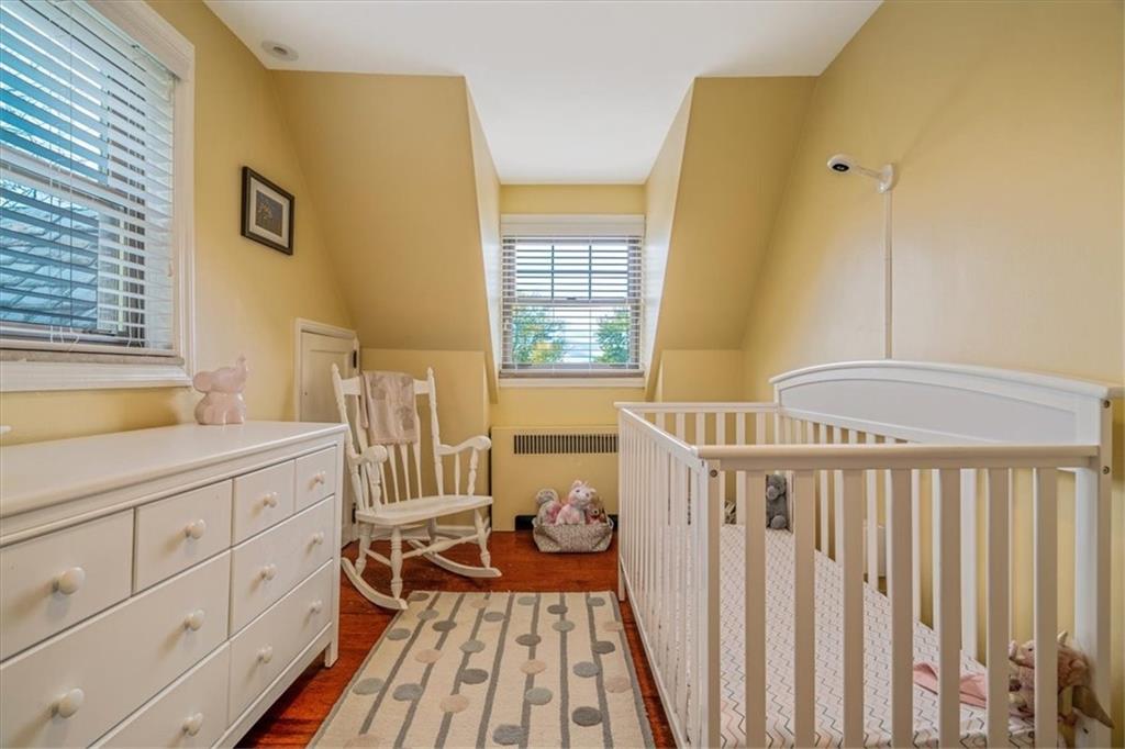 21 Marquette Road Pittsburgh, PA 15229 - Photo 28 of 44 a bedroom with a bed and a large window