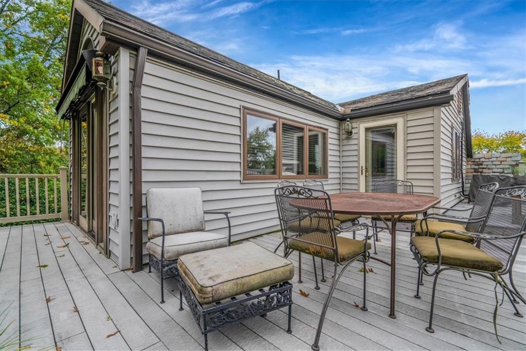 21 Marquette Road Pittsburgh, PA 15229 - Photo 31 of 44 a backyard of a house with barbeque oven table and chairs