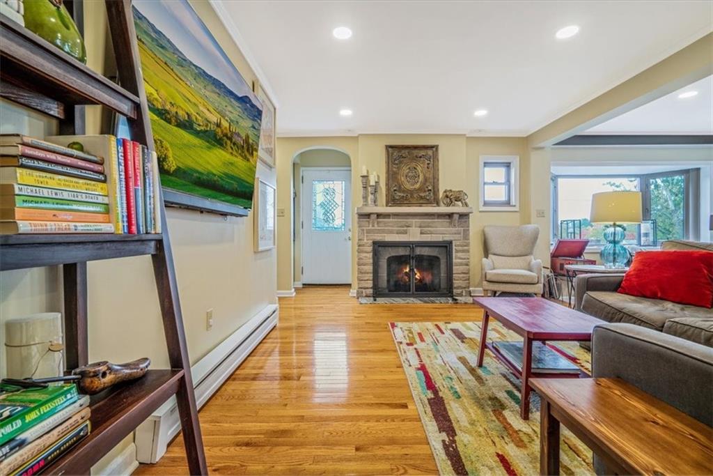 21 Marquette Road Pittsburgh, PA 15229 - Photo 6 of 44 a living room with furniture and a fireplace