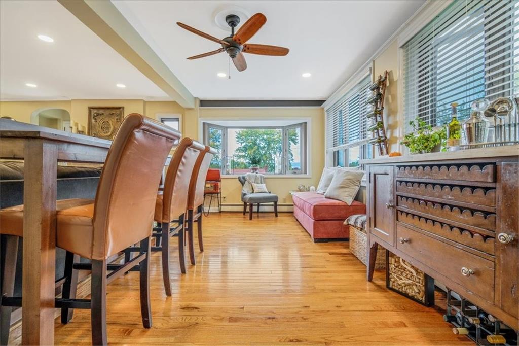 21 Marquette Road Pittsburgh, PA 15229 - Photo 9 of 44 a living room with furniture a window and wooden floor