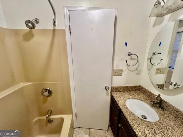 2515 Skyland Trail Northeast Brookhaven, GA 30319 - Photo 27 of 41 a bathroom with a granite countertop sink and mirror with bathtub