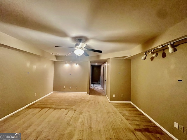2515 Skyland Trail Northeast Brookhaven, GA 30319 - Photo 32 of 41 a view of a room with a flat screen tv and chandelier fan