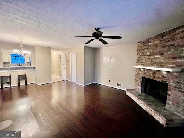 2515 Skyland Trail Northeast Brookhaven, GA 30319 - Photo 38 of 41 a view of empty room with wooden floor and fireplace