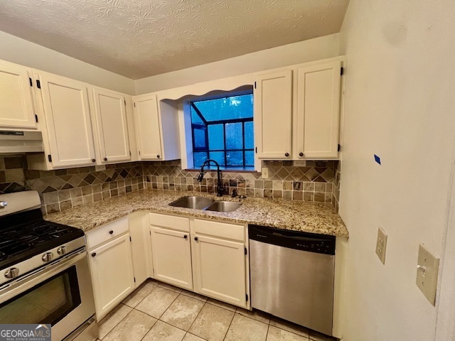 2515 Skyland Trail Northeast Brookhaven, GA 30319 - Photo 9 of 41 a kitchen with granite countertop a sink a stove and cabinets