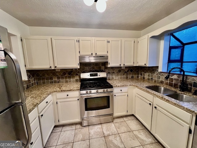 2515 Skyland Trail Northeast Brookhaven, GA 30319 - Photo 10 of 41 a kitchen with cabinets appliances a sink and a counter top space
