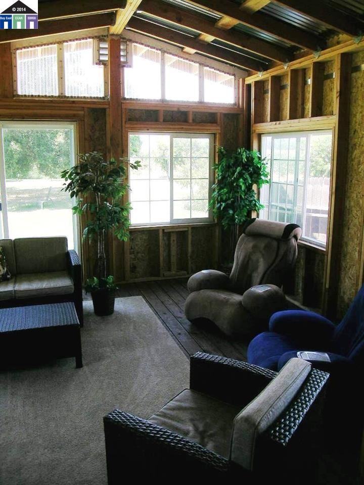 681 Tyler Island Bridge Road Isleton, CA 95641 - Photo 15 of 24 a living room with furniture and a window