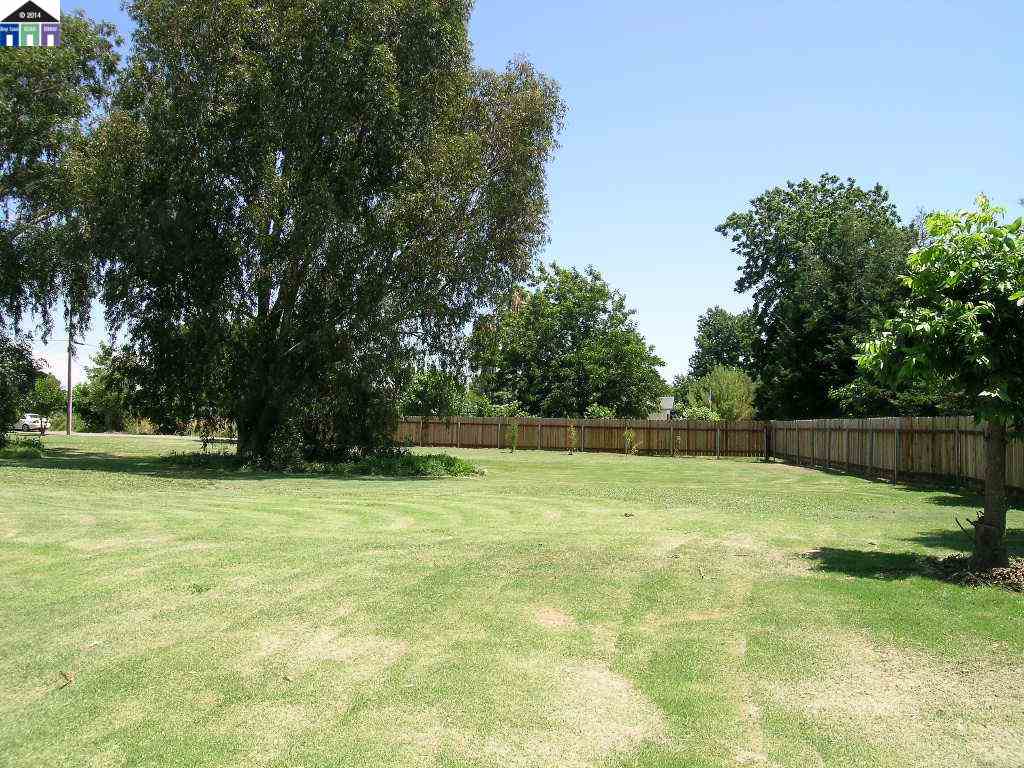681 Tyler Island Bridge Road Isleton, CA 95641 - Photo 23 of 24 a swimming pool with wooden fence