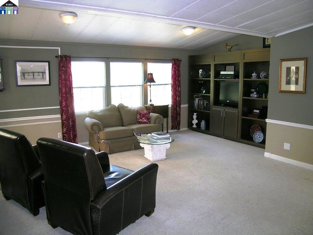 681 Tyler Island Bridge Road Isleton, CA 95641 - Photo 10 of 24 a living room with furniture and a window