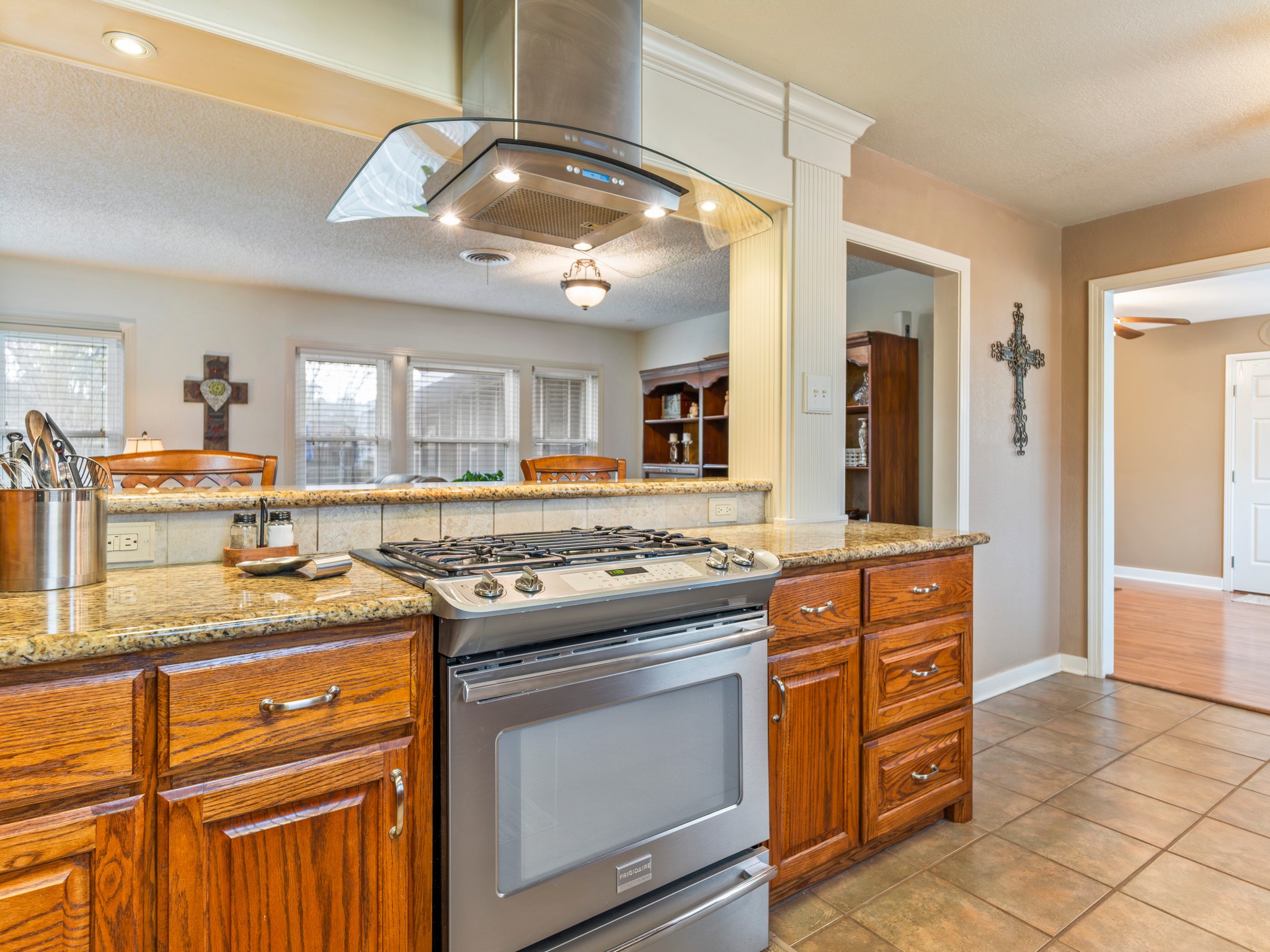 910 6th Street Bay City, TX 77414 - Photo 13 of 34 a kitchen with a stove a sink and a refrigerator