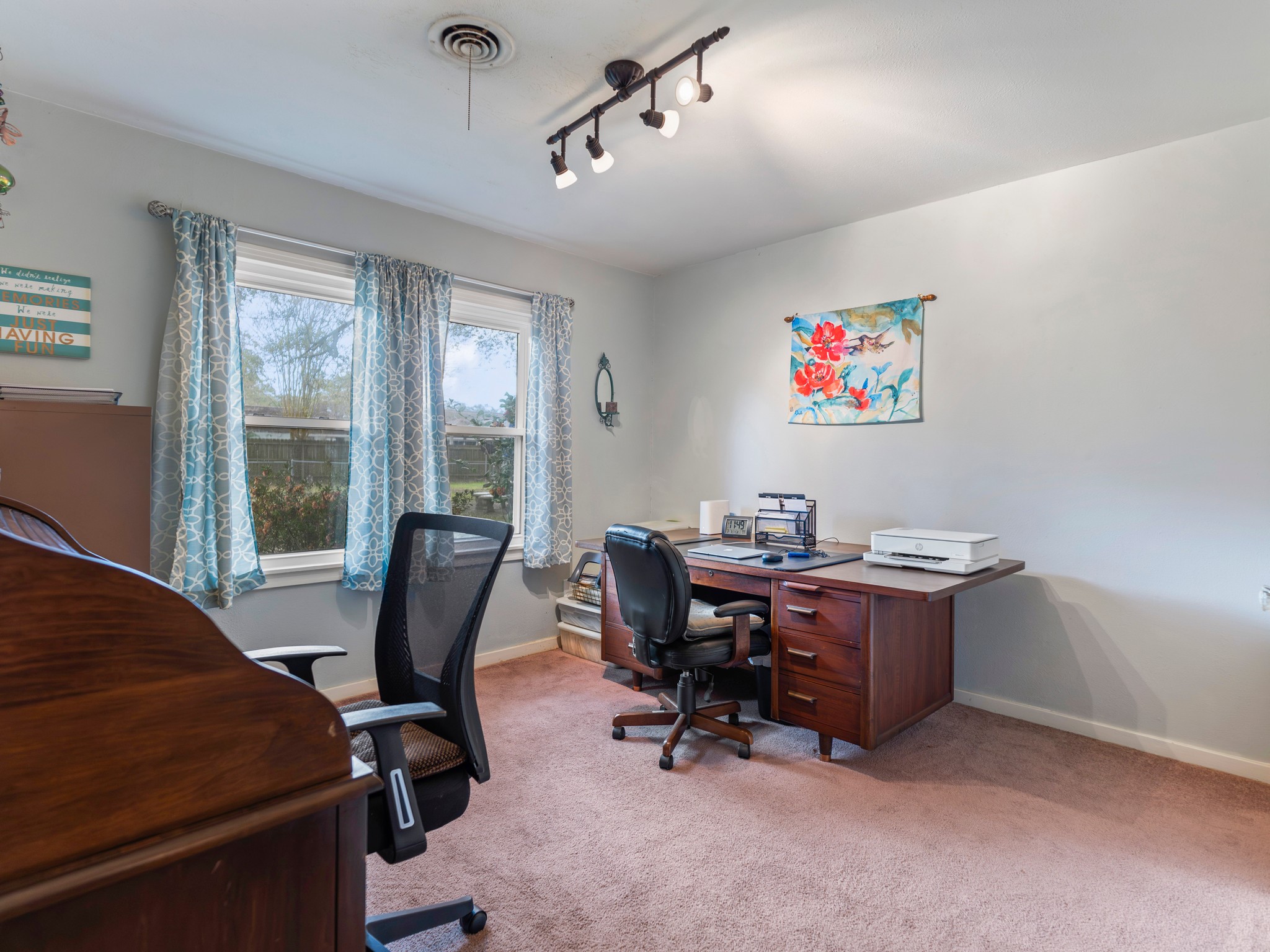 910 6th Street Bay City, TX 77414 - Photo 24 of 34 a view of a workspace with furniture and a window