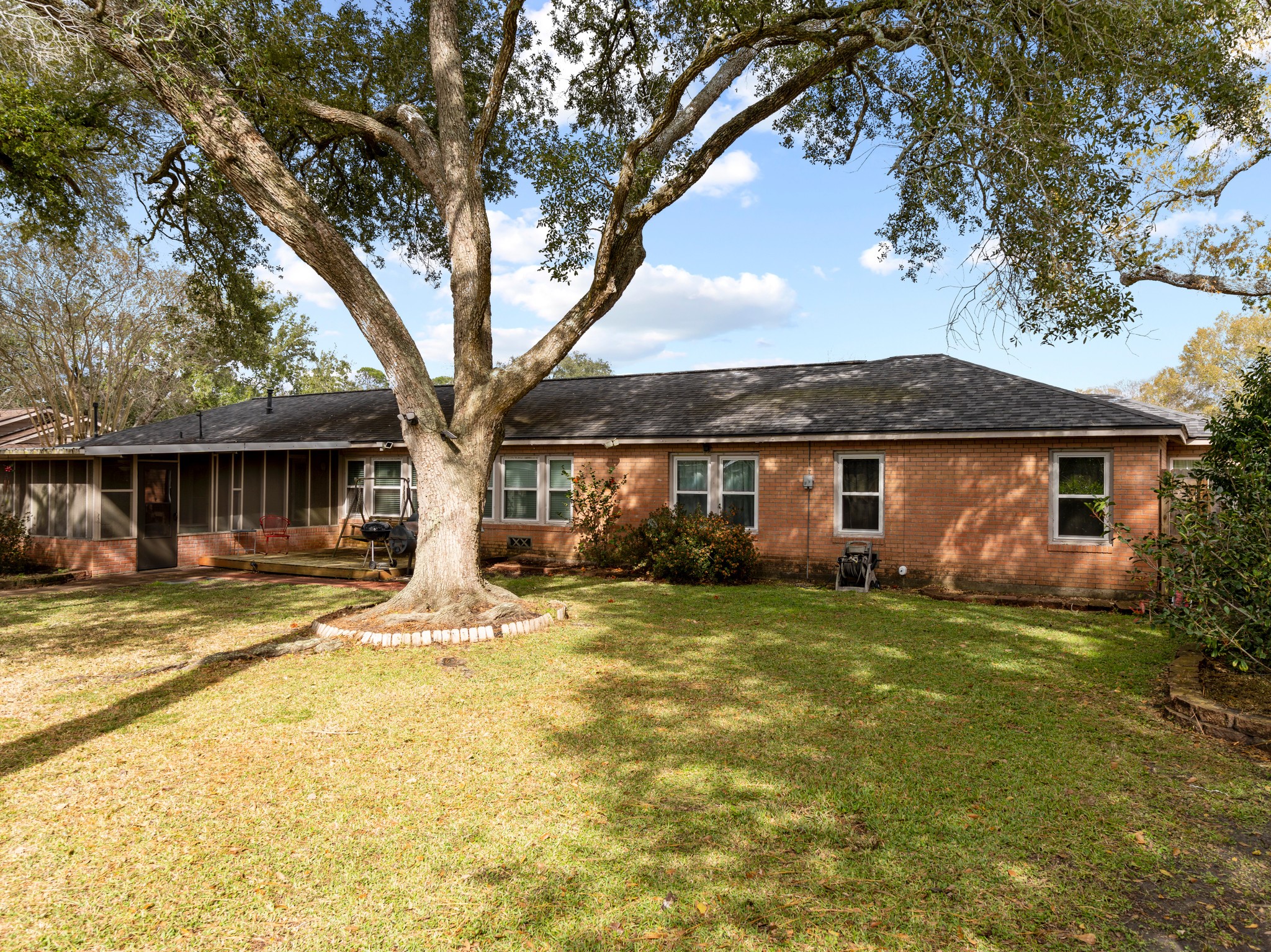910 6th Street Bay City, TX 77414 - Photo 6 of 34 a front view of a house with a yard