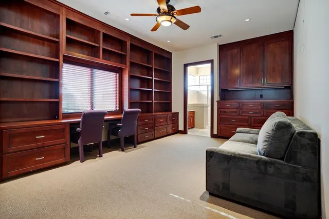a view of a living room and entryway