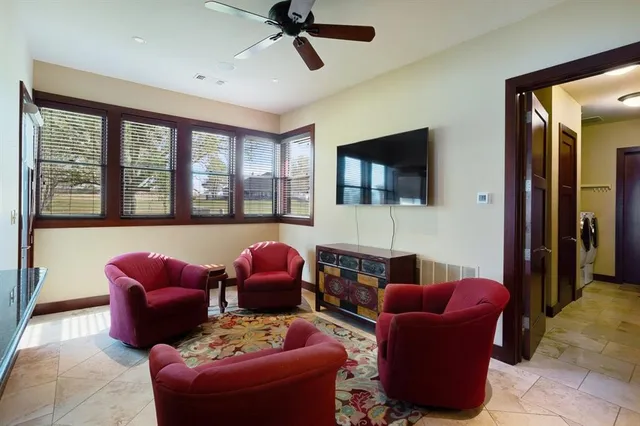 a kitchen with stainless steel appliances granite countertop a kitchen island a stove and a sink