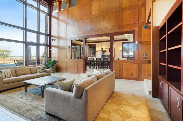 a outdoor space with patio the couches and a fireplace