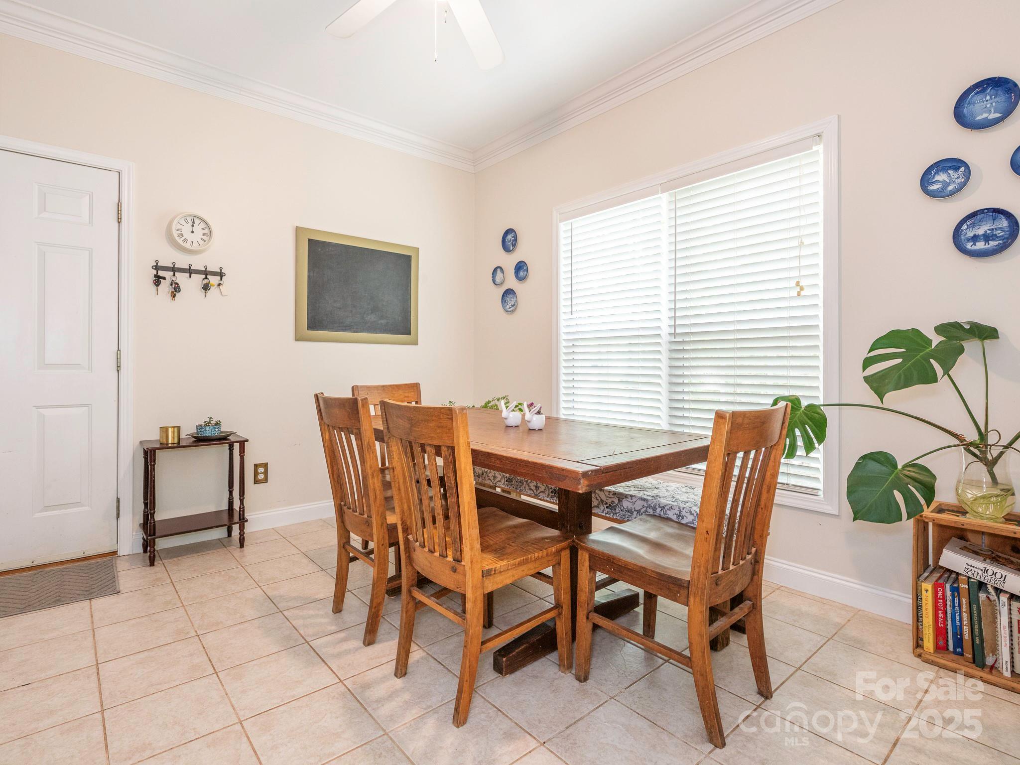 3033 Beech Court Indian Trail, NC 28079 - Photo 13 of 39 a dining room with furniture and window