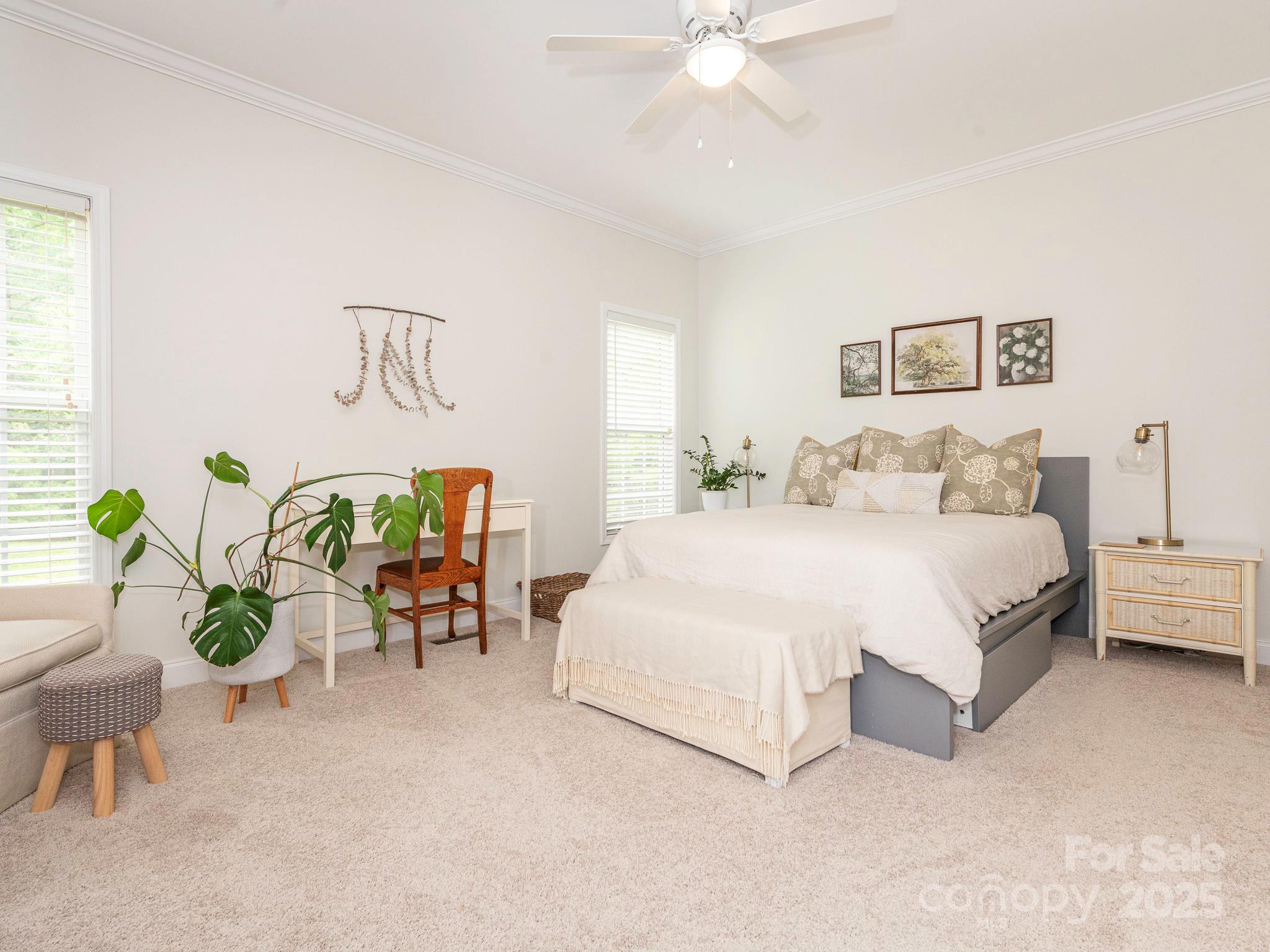 3033 Beech Court Indian Trail, NC 28079 - Photo 17 of 39 a bedroom with furniture and a bed