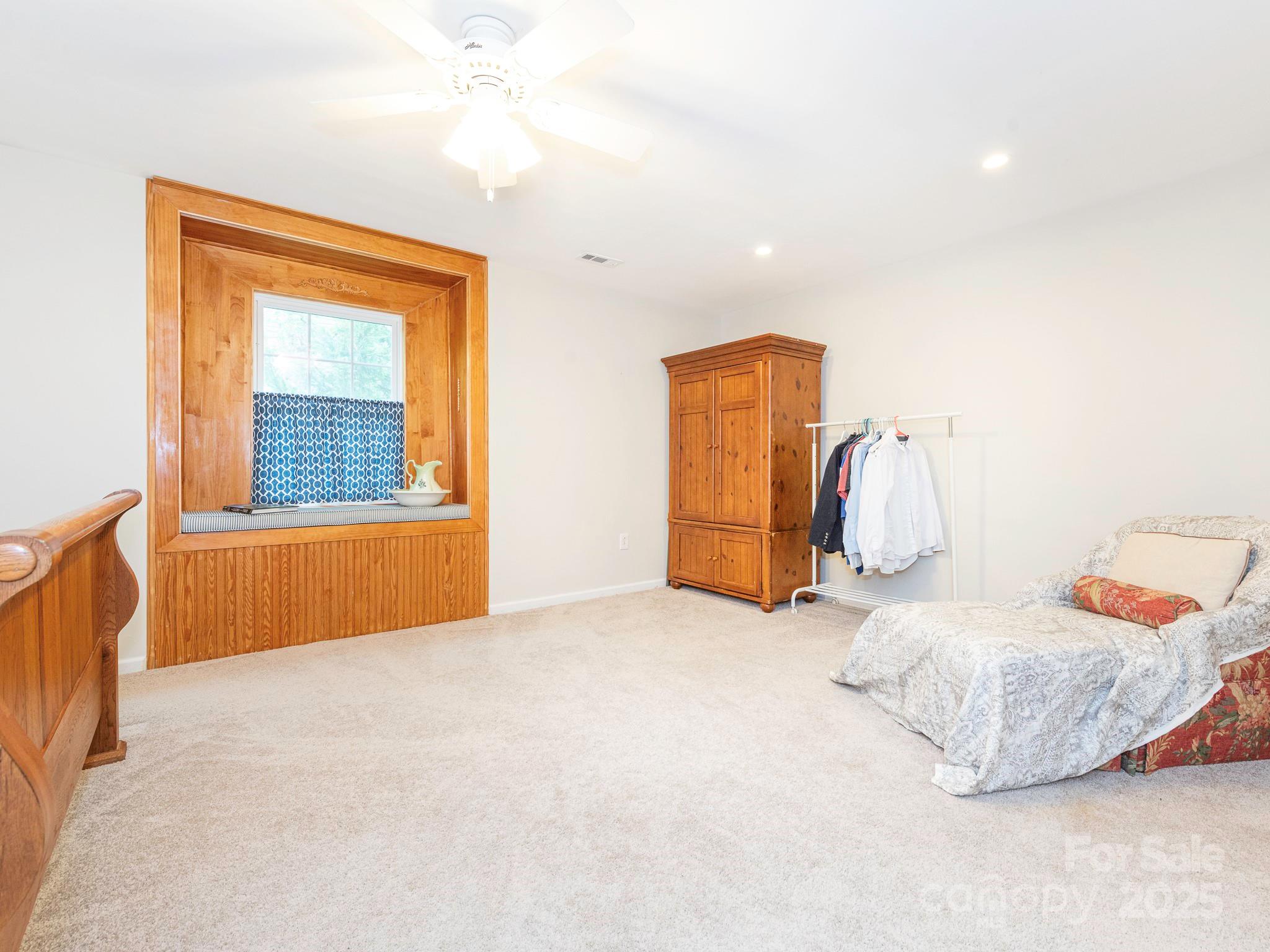 3033 Beech Court Indian Trail, NC 28079 - Photo 23 of 39 a bedroom with a bed and a window