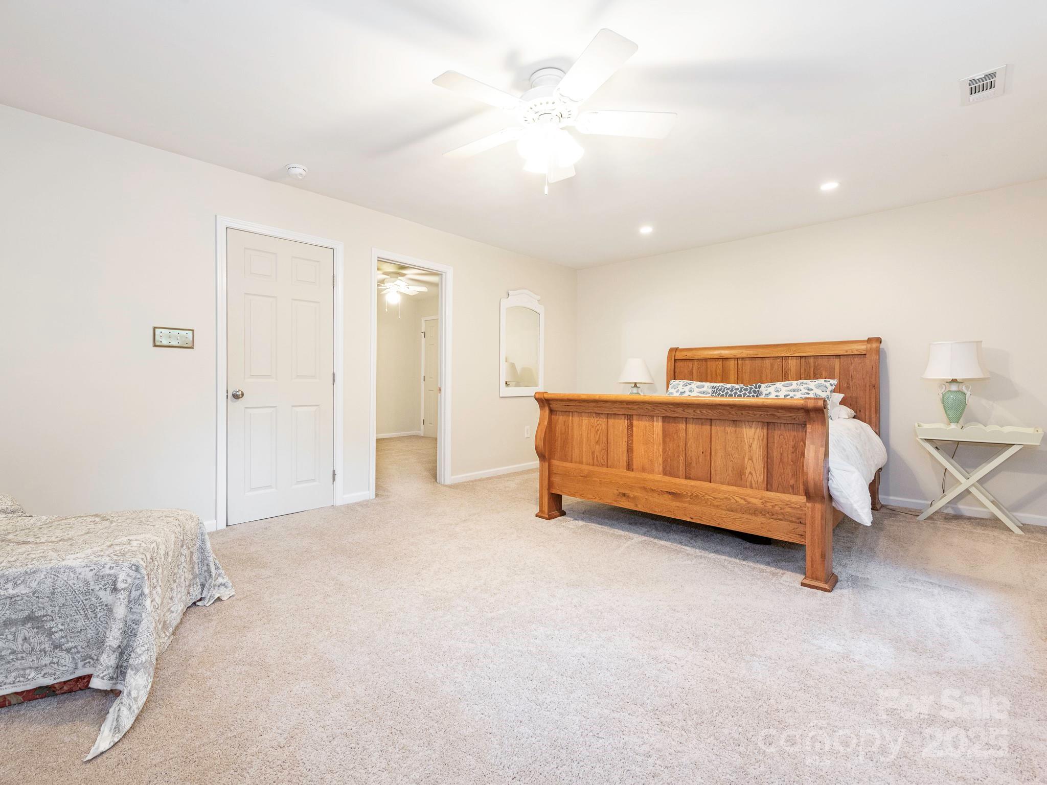 3033 Beech Court Indian Trail, NC 28079 - Photo 24 of 39 a view of a bedroom with closet and windows