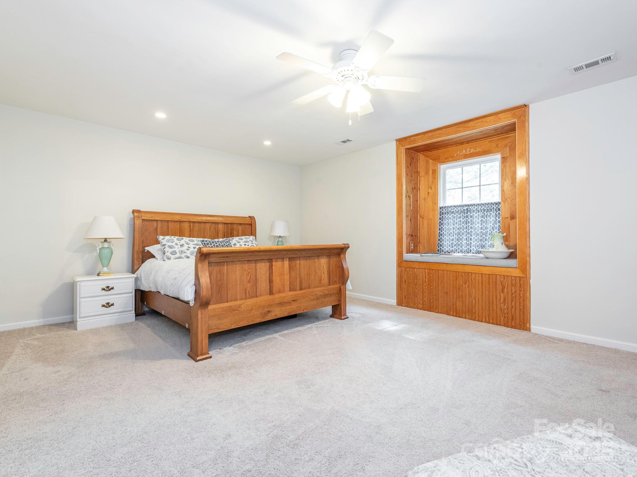 3033 Beech Court Indian Trail, NC 28079 - Photo 25 of 39 a bedroom with furniture and window