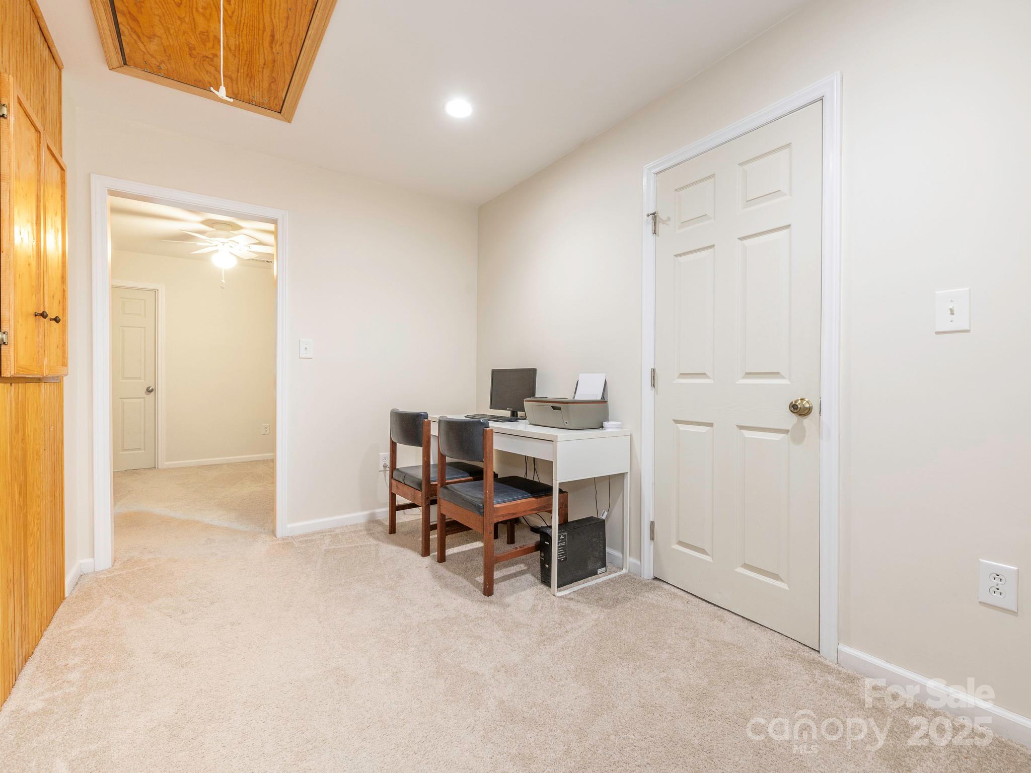 3033 Beech Court Indian Trail, NC 28079 - Photo 30 of 39 a view of a workspace with furniture and a bathroom