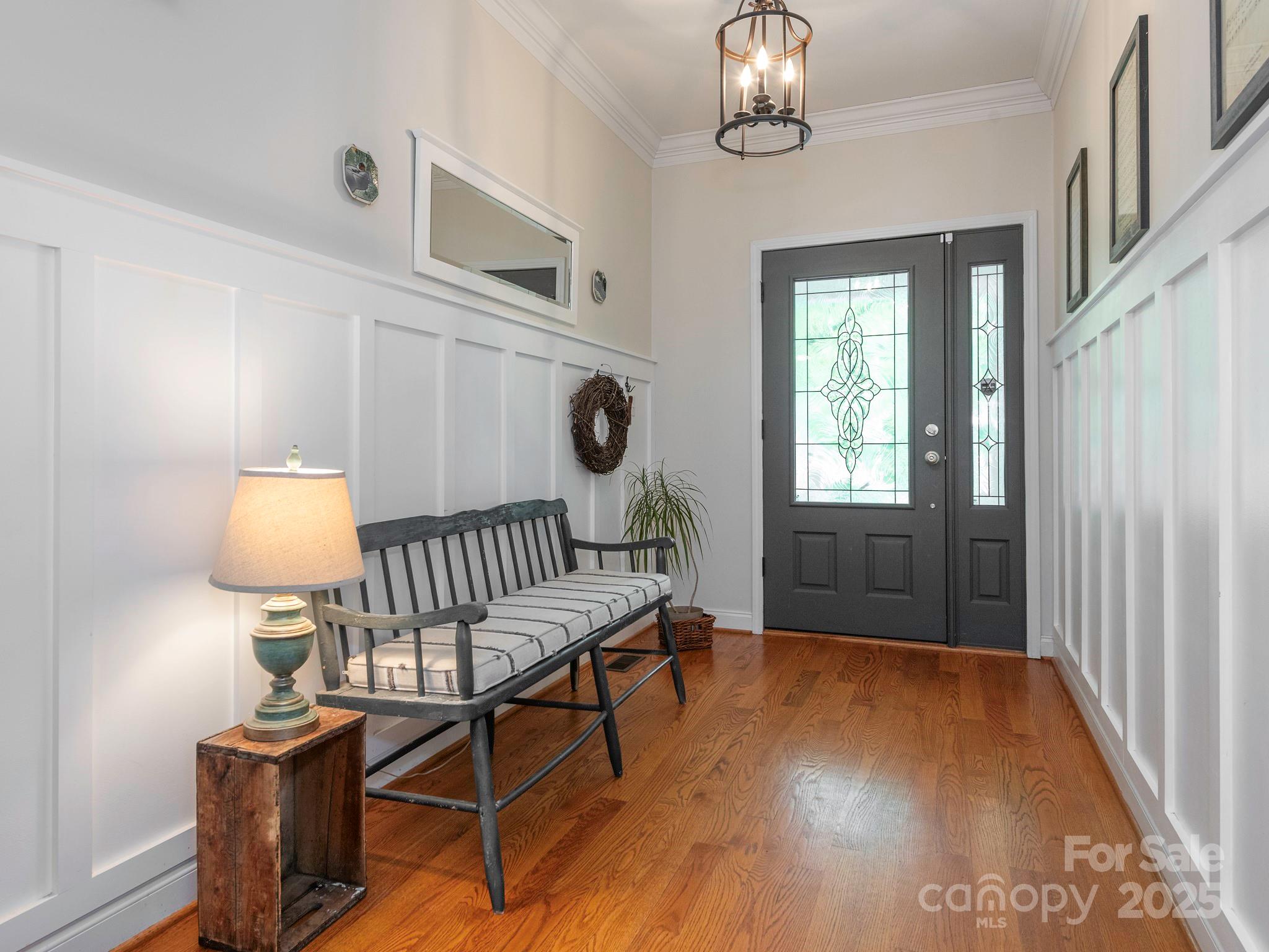 3033 Beech Court Indian Trail, NC 28079 - Photo 3 of 39 a view of an entryway with wooden floor