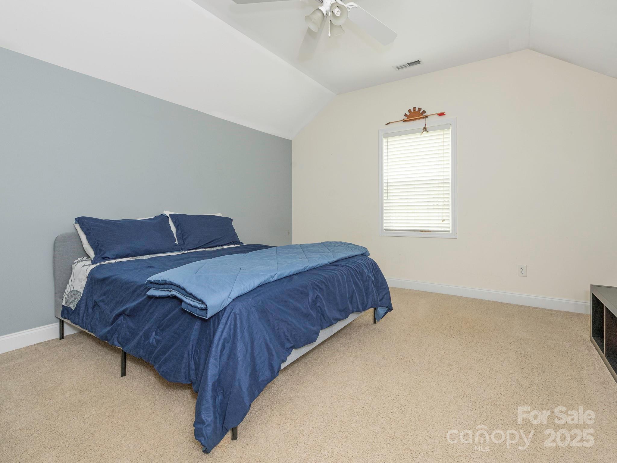 3033 Beech Court Indian Trail, NC 28079 - Photo 31 of 39 a bedroom with a bed and window