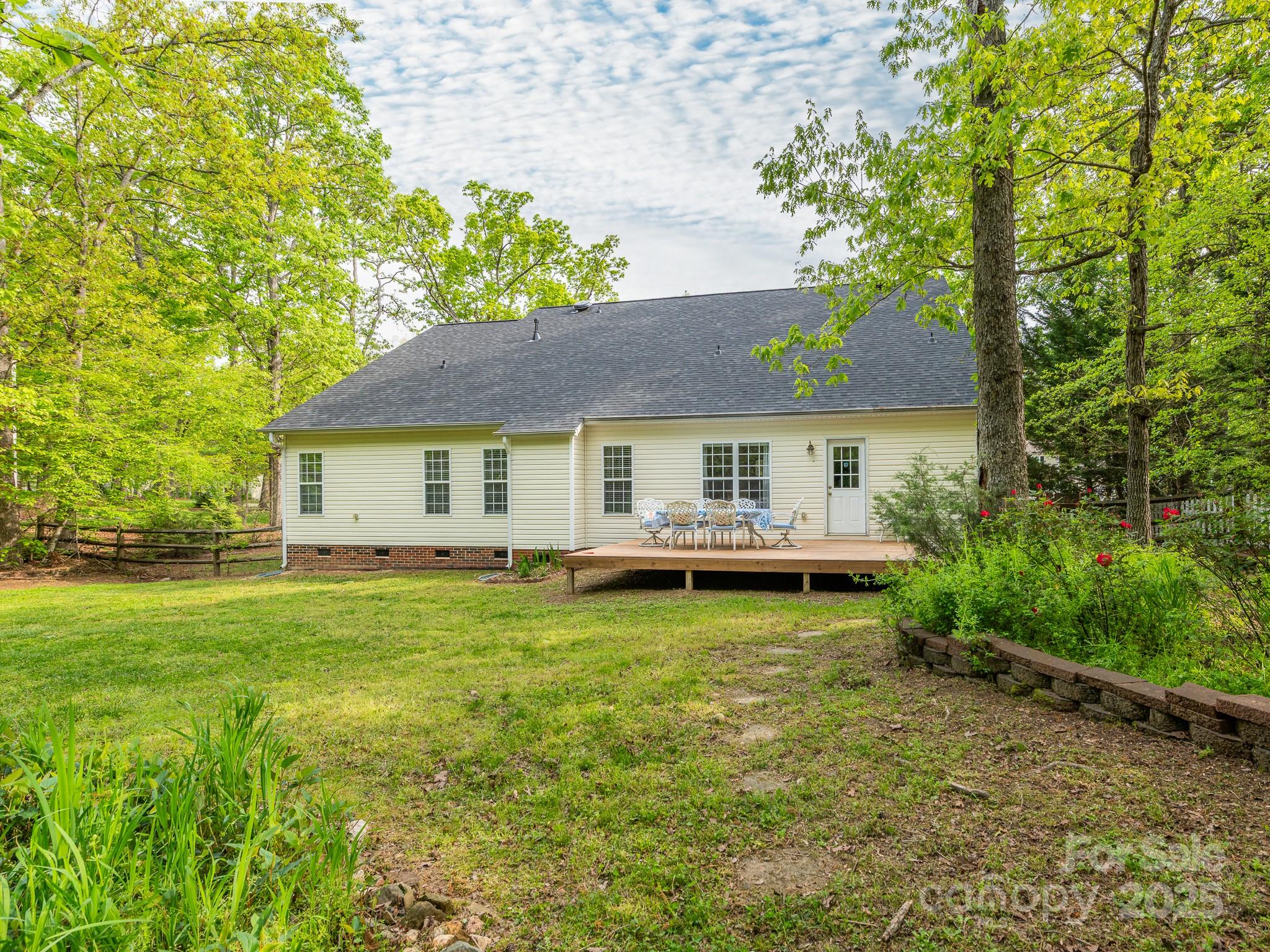 3033 Beech Court Indian Trail, NC 28079 - Photo 38 of 39 a view of a house with a yard porch and sitting area
