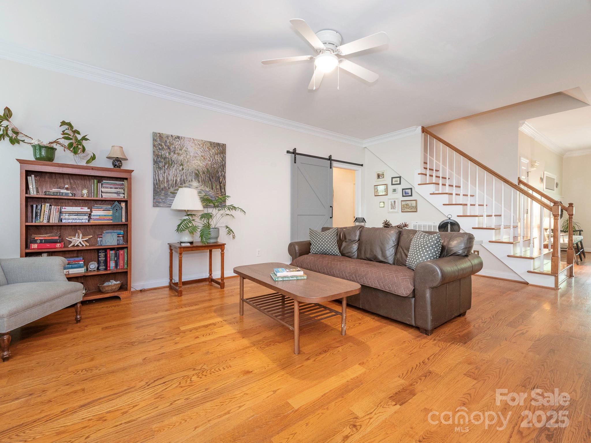 3033 Beech Court Indian Trail, NC 28079 - Photo 6 of 39 a living room with furniture and a wooden floor