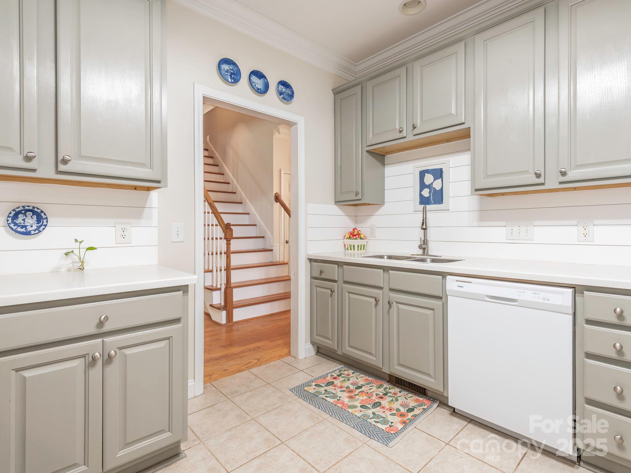 3033 Beech Court Indian Trail, NC 28079 - Photo 9 of 39 a kitchen with a sink cabinets and appliances