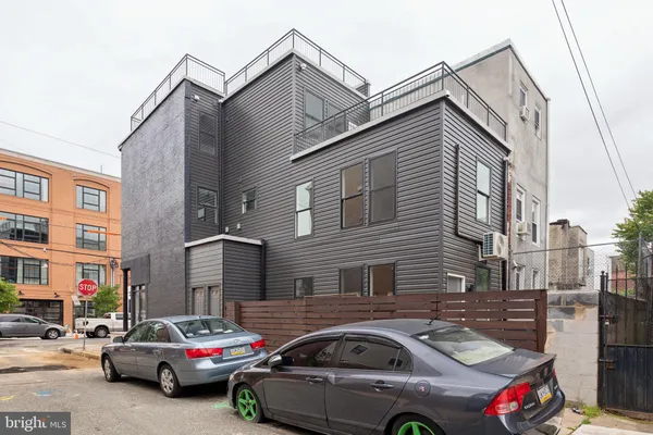 a car parked in front of a building